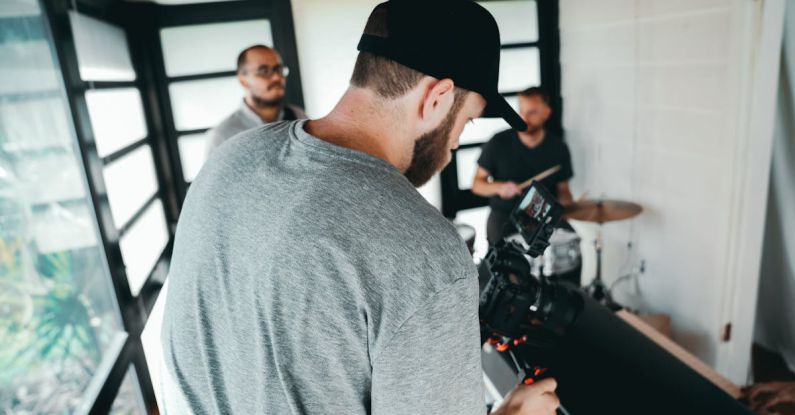Recording Drums - Taking Photo Of A Man Playing Instrument