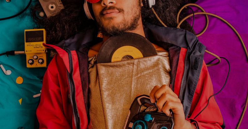 Ambient Sounds - Man Listening To Music With Headphones