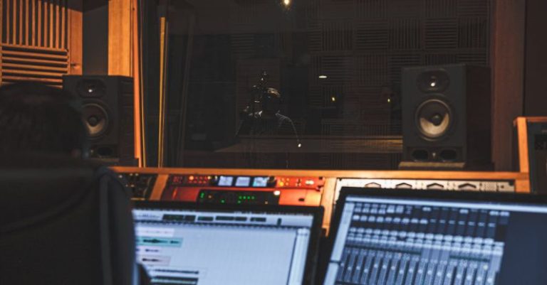 Recording Process - Unrecognizable sound engineer working with musical software on computer