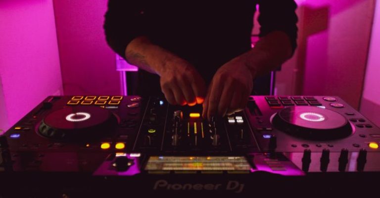 DJing - Person in Black Long Sleeve Shirt Playing Dj Controller