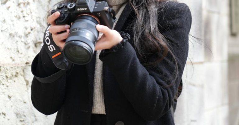 Digital DJing - Woman Looking at Camera Viewer
