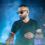 DJ Effects - A Bearded Man Using an Audio Mixer on a Nightclub