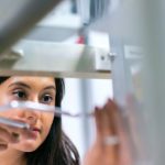 Sound Engineering Equipment - Photo Of Female Engineer Working On An Equipment