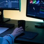 Sound Engineer - Editor working on a Computer