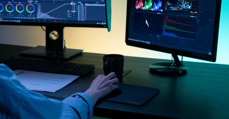 Sound Engineer - Editor working on a Computer