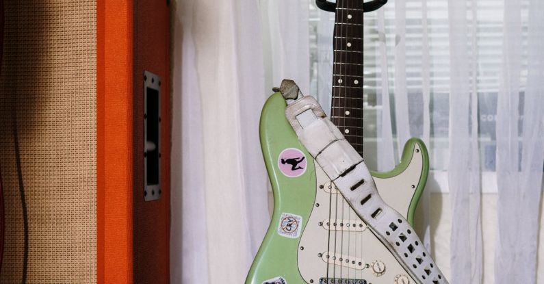 Surround Sound Systems - White and GreenStratocaster Electric Guitar