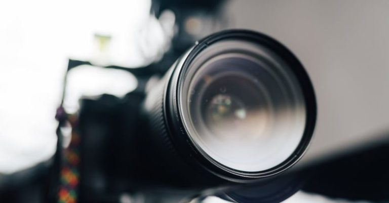 Surround Sound System - Professional video camera and microphone in studio