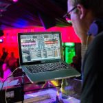 Surround Sound Speakers - Dj Sitting Near on Table