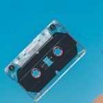 24-Bit Audio - Person Doing Tricks on Cassette Tape