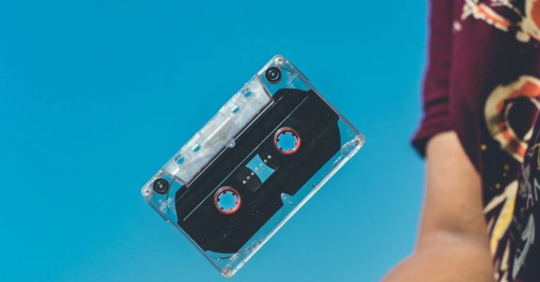 24-Bit Audio - Person Doing Tricks on Cassette Tape