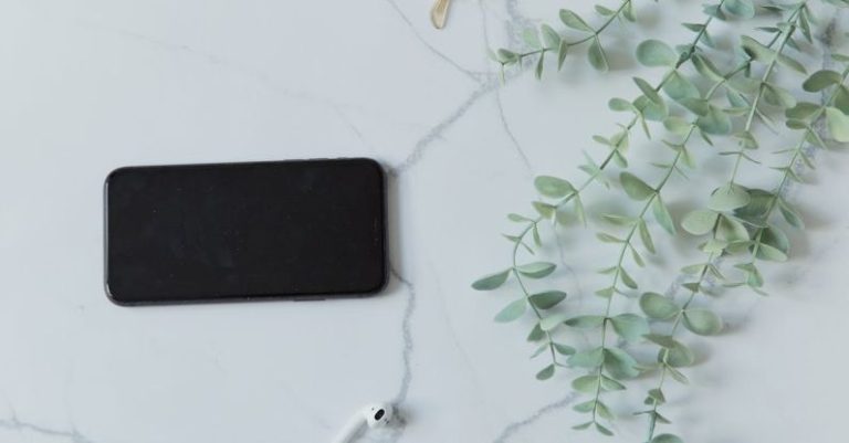 Bluetooth Headphones - Smart Phone and Bluetooth Headphones and Glasses on White Background