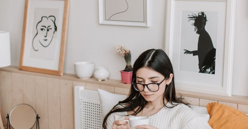 Streaming Royalties - Woman Having Coffee And Using Laptop In Bed