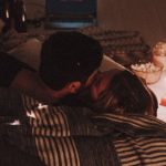 Lossless Streaming - Couple Kissing on a Couch