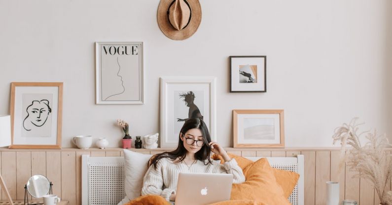 Subscription Streaming - Woman Using Laptop In Bed