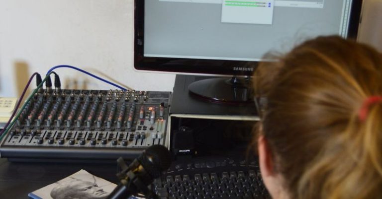 Software Updates - Unrecognizable sound engineer installing software on desktop computer at home