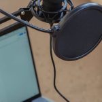 Music Production Workflow - Microphone on tripod attached to laptop in studio