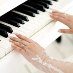 Sound Quality - A woman in a white dress playing the piano