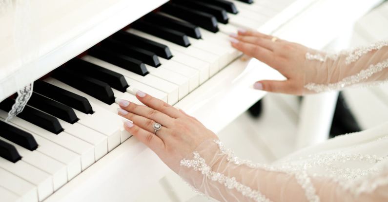 Sound Quality - A woman in a white dress playing the piano